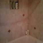 AMERICAN STANDARD TUB IN BONE WITH 12X12 AND 6X6 ITALIAN PORCELAIN TILE RECESS BOX