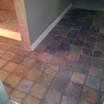 CORNER RETURN OF KNEE WALL AND TRANSITION OF TILE TO PAINTED WALLS WITH NEW SLATE TILE INSTALLED