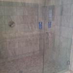 LARGE CUSTOM TILE SHOWER  AND FRAMELESS GLASS ENCLOSURE