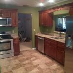 KITCHEN REMODEL NEW 18X18 EARTH TONE TILE SS APPLIANCES NEW PASS THRU , NEW RECESS LIGHTS , CEILING REBUILT HENNESEY CABINETS WITH CROWN AND VALANCE