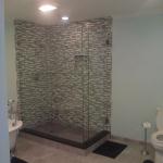 NEW LAYOT SHOWING MOSAIC GLASS BLISS TILE, RECESS LIGHT, FAN COMBO, CUSTOM GLASS FULL REMODEL WITH RECESS BOX AND GRANITE ABSOLUTE BLACK CURB