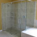 SHOWER ONLY REMODEL WE KEPT THE EXISTING TILE AROUND THE SOAKER TUB AND INTALLED SIMILAR MATCH TILE FOR SHOWER