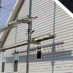 SIDING SCAFOLD AND NEW SIDING INSTALLED