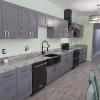Kitchen after 12 foot run cabinets and a bar area